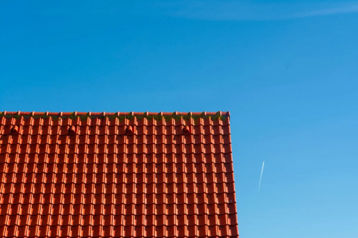 Tile roof gable in full sun, the kind of exposure that sets roof life in Broken Arrow, OK